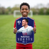 Kid holding the Andy Robertson Tottenham FC27 football card