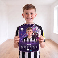 Young Newcastle fan holding his purple FC27 Future Stars personalised football card