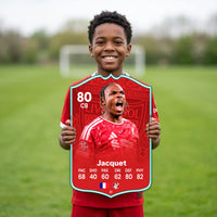Kid holding the Jérémy Jacquet Liverpool FC27 football card