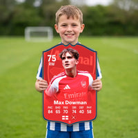 Kid holding the Max Dowman Arsenal FC27 football card