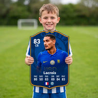 Kid holding the Maxence Lacroix Chelsea FC27 football card